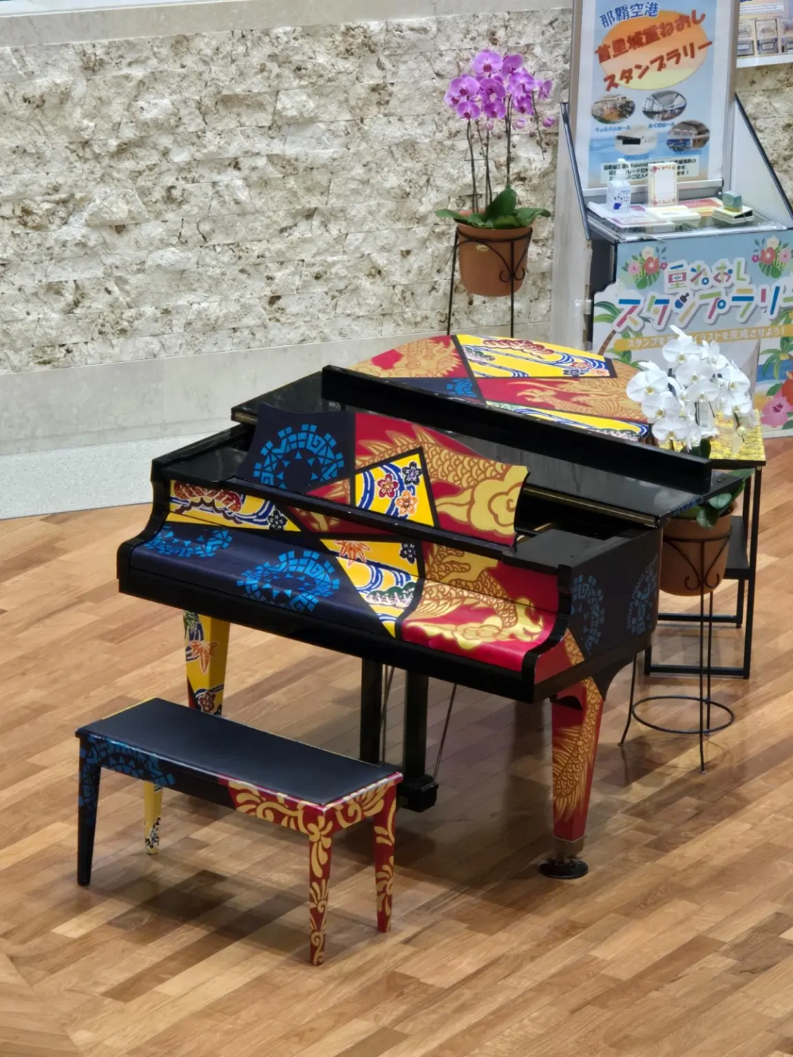 A vividly painted piano on display